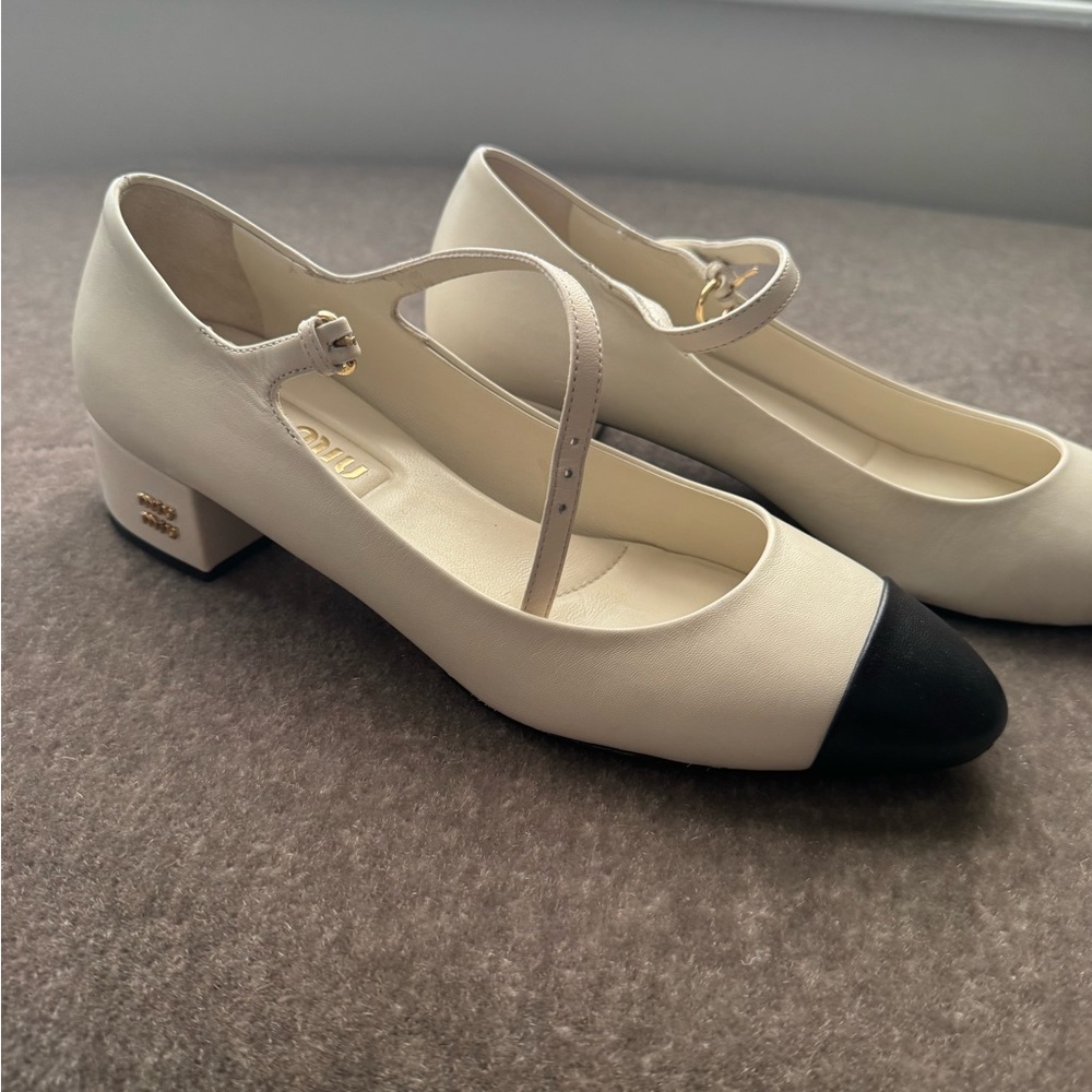 Miu Miu Cream and Black Block Heel Mary Jane’s